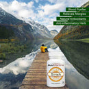 AyuMantra Sirish tablets pack by a mountain lake scene highlighting blood purifier benefits.